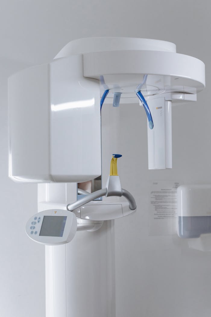 Dental imaging machine in a clinic setting, ideal for dental practices.